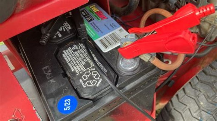 How does a riding mower charge the battery