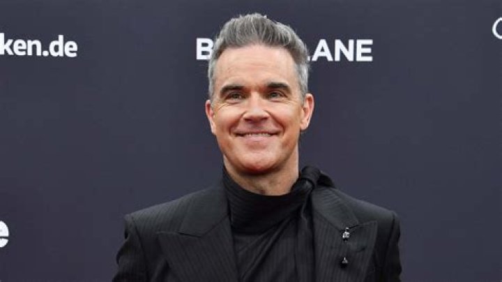 Robbie Williams (Pop Singer) - Age, Birthday, Bio, Facts, Family, Net Worth, Height & More