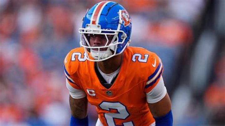 Who is number 22 for the Broncos? What team is Kareem Jackson on?